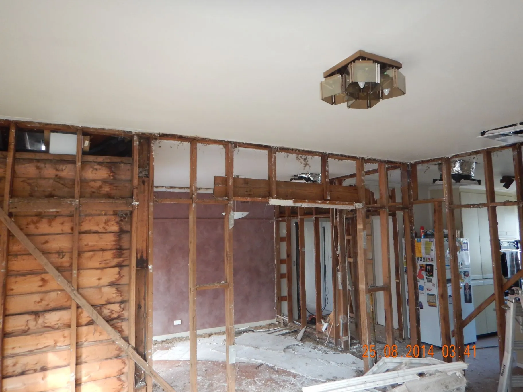 Bentleigh East renovation with exposed timber framing, ladder, and open interior
