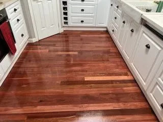 Timber floor finish and white cabinetry in the Eynesbury kitchen