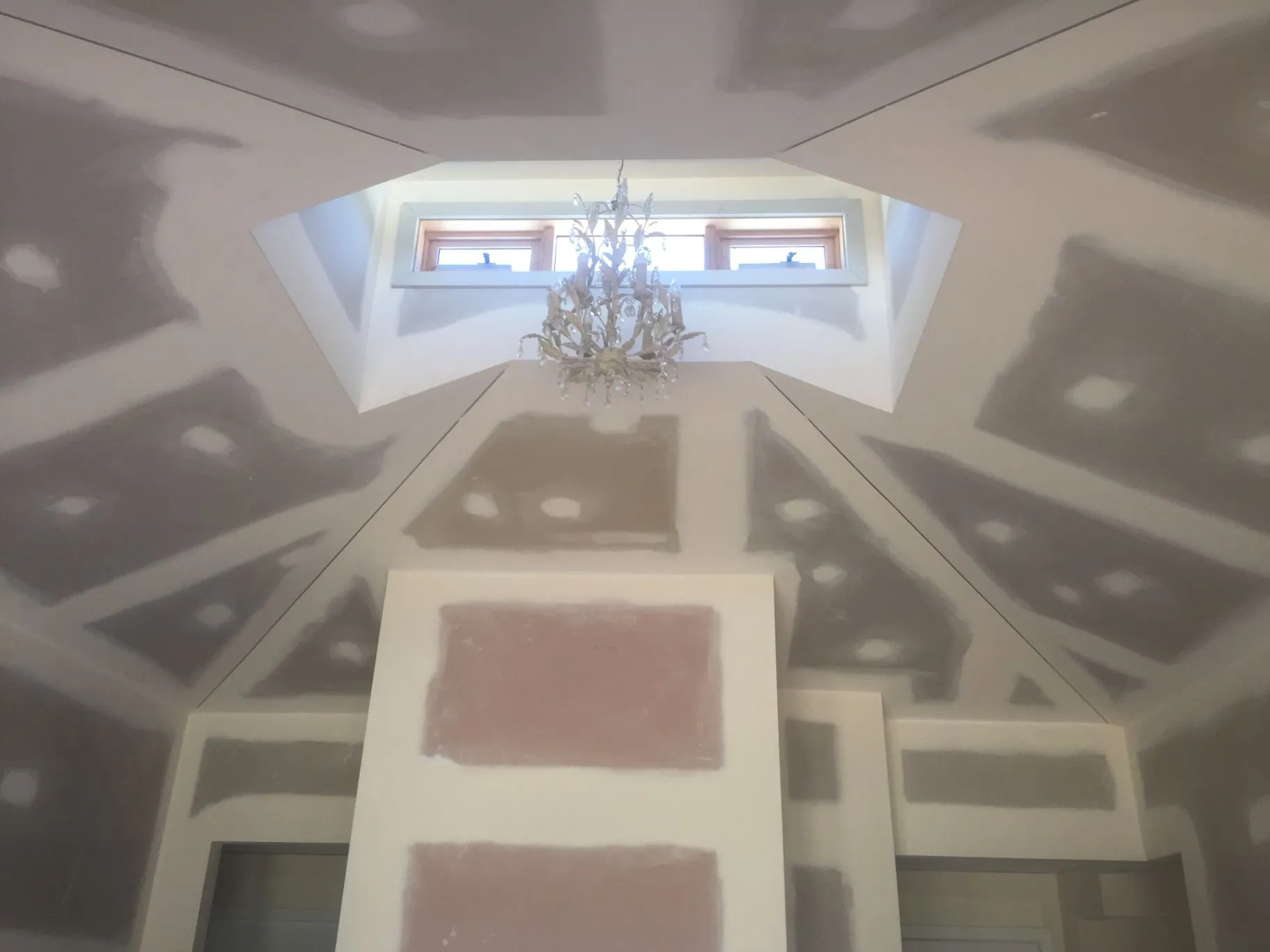 Interior ceiling and chandelier detail during the Kyneton renovation