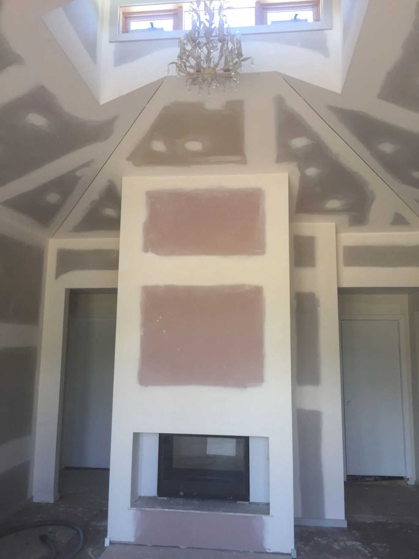 Tall interior view of the fireplace and ceiling detail