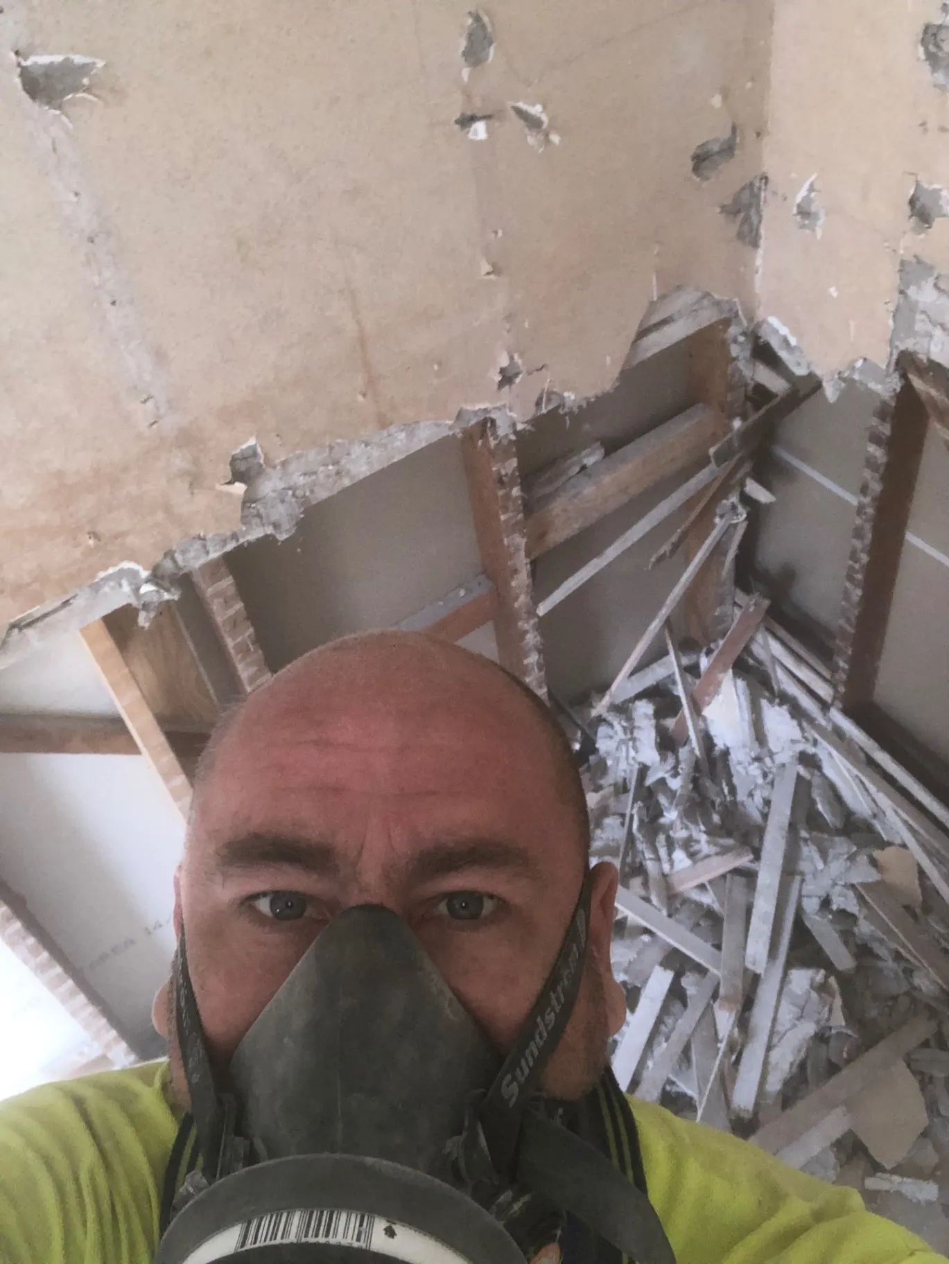 Oakleigh renovation wall opened to reveal timber framing and demolition work